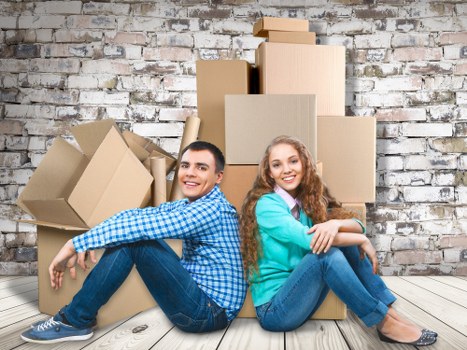Commercial moving team working in a busy Tooting street