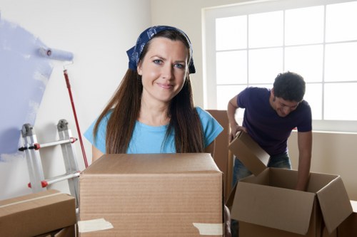 Staff using a risk assessment checklist during a removals job