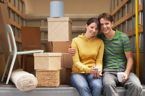 Packed boxes and furniture prepared for transport in a removals van