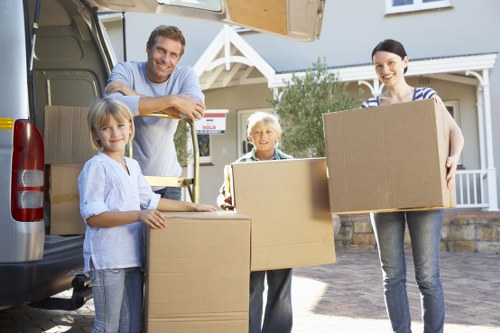 Loading furniture into a removal van for a local move