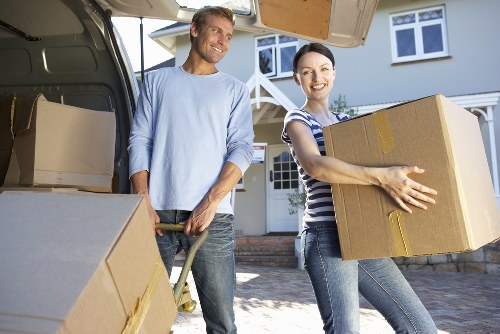 Prepared moving day checklist and stacked boxes for a Tooting move